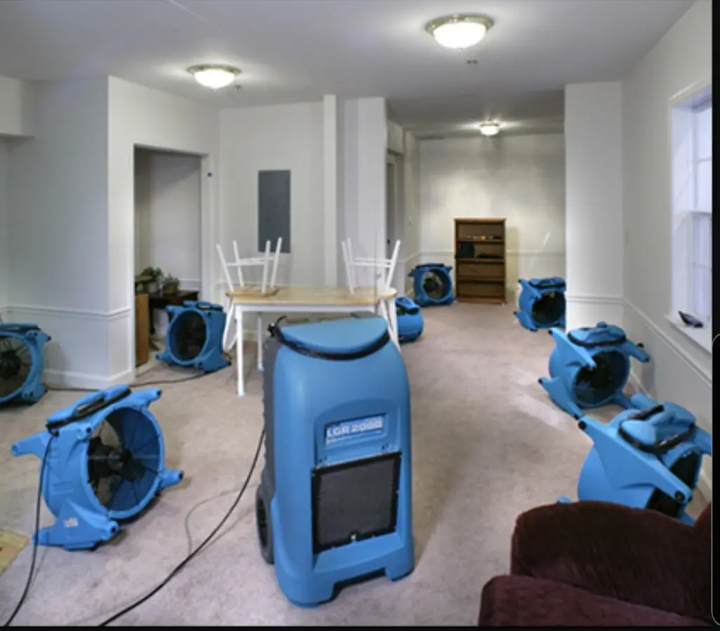 Air movers and dehumidifier setup for Water Damage Restoration in Seabrook